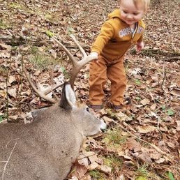 Easton with deer - Drew Baggarly