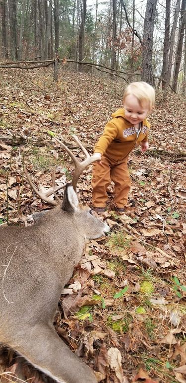 Easton with deer - Drew Baggarly