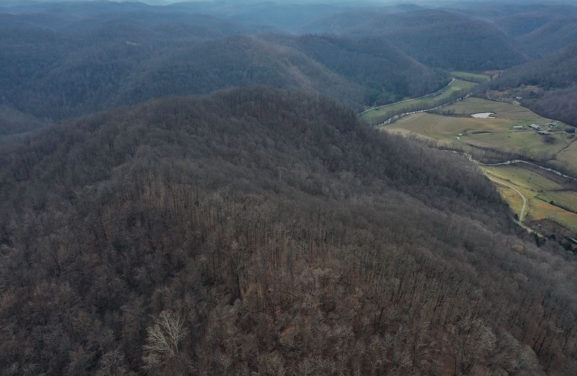 002 aerial drone shot from the northwest corner looking south along the west boundary