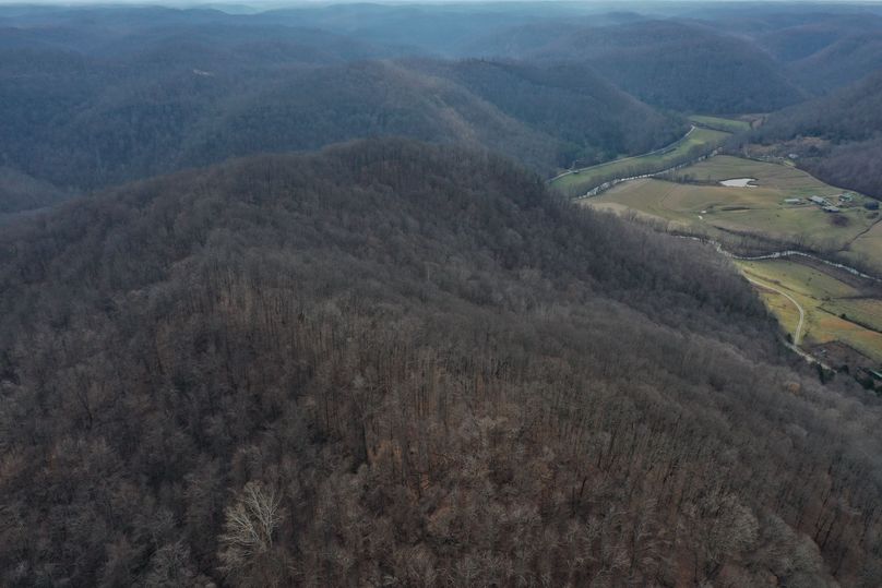 002 aerial drone shot from the northwest corner looking south along the west boundary