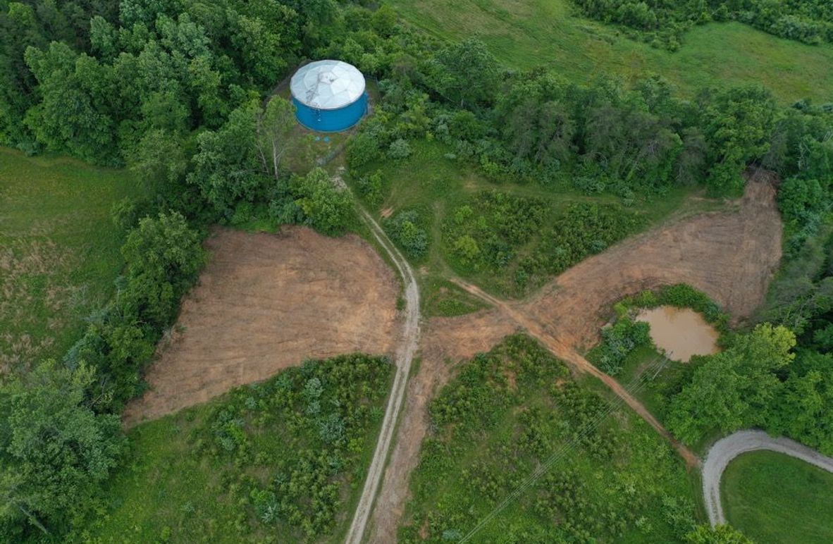 005 low elevation aerial drone shot of the south portion of the property