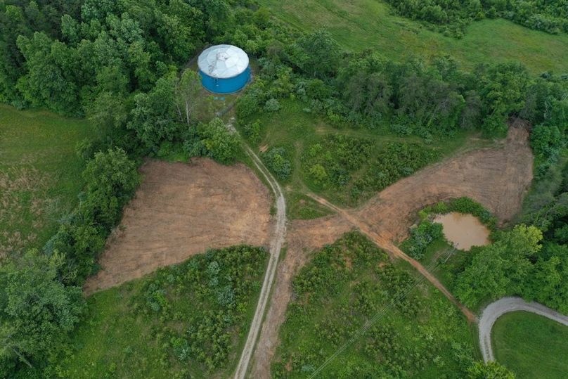 005 low elevation aerial drone shot of the south portion of the property