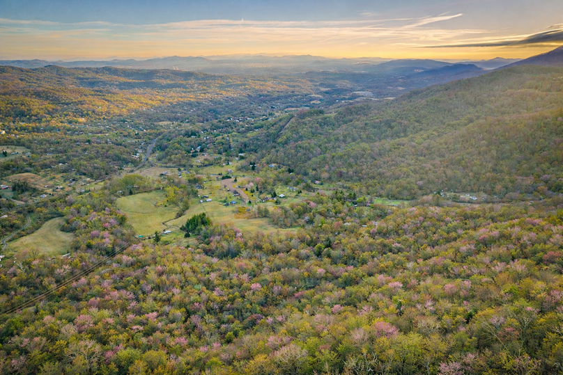 Spring sunset over a green valley