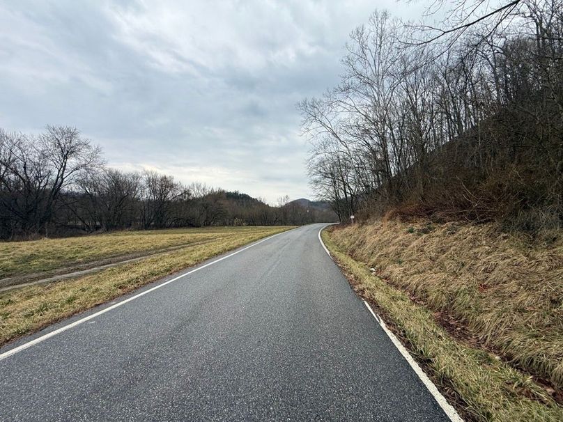 005 the blacktop road (Hwy 581) leading along then north boundary
