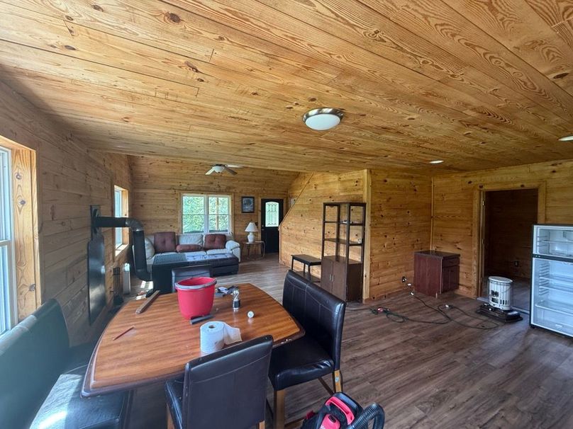 034 view from back sliding glass doors through the dining room