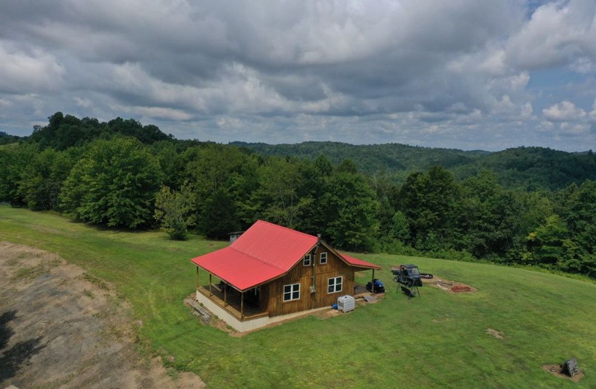 001 low elevation drone view of the cabin