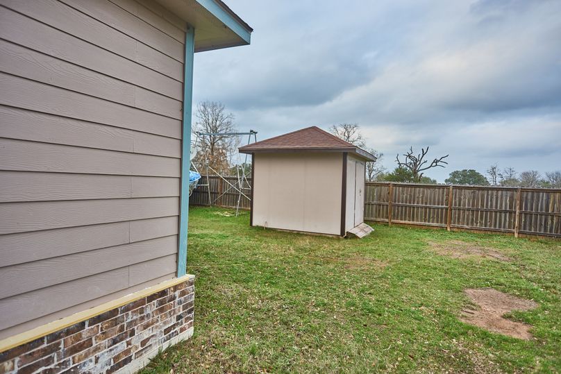 21 storage shed in back of home