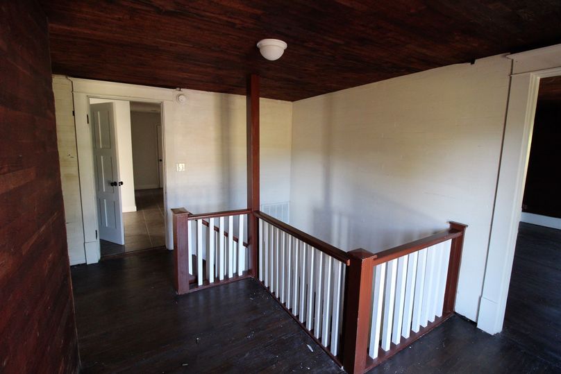 056 upstairs hallway and entryway from downstairs