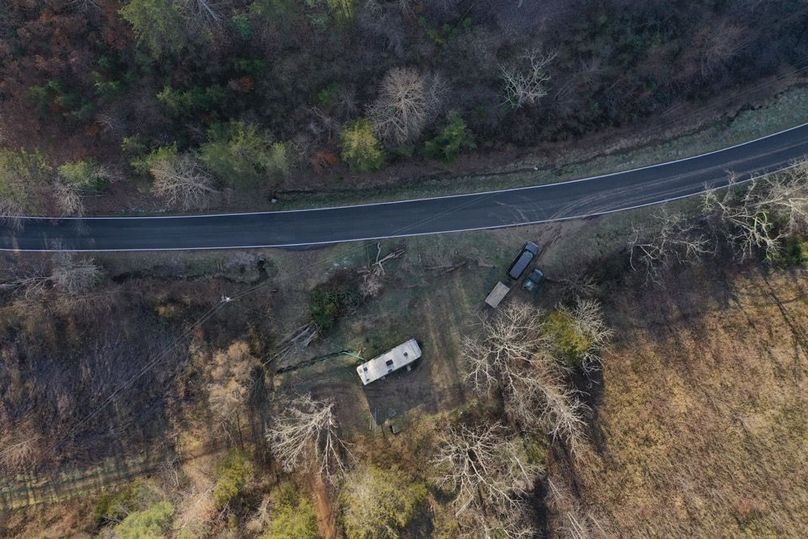 040 low elevation drone shot directly above the camper pad with full utilities (camper not included)