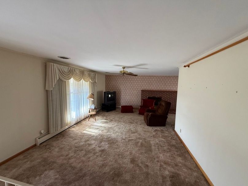 024 view of the living room from the step landing at the front door