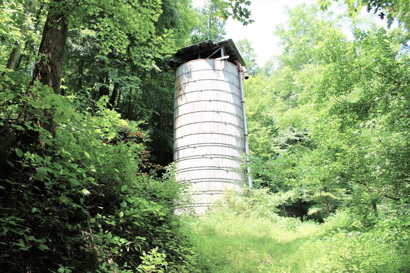007 huge silage silo in the valley along the creek