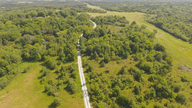 004 - scenic driveway meanders to the home