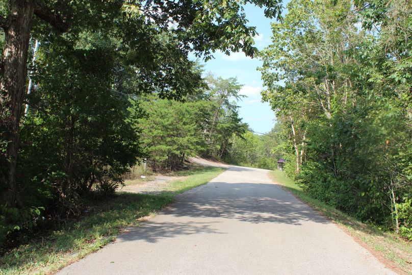 006 the county black top road leading along the north boundary of the property