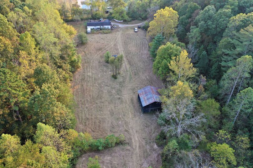008 drone shot of the home and barn near the south boundary of the property