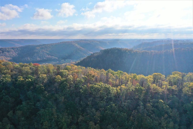 002 drone shot looking to the east from the center of the property