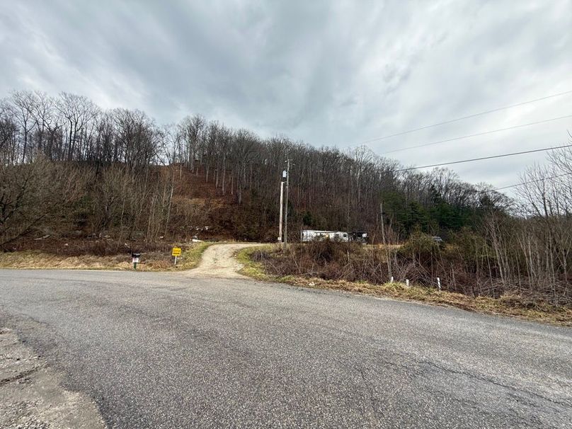 008 the entrance into the property at the north boundary off of Hwy 581
