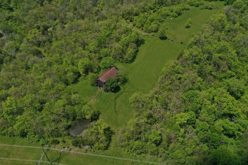 020 the single barn and small pond in the far southeast part of the property