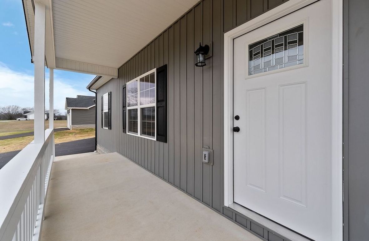 Pix 4 ext front porch view to L