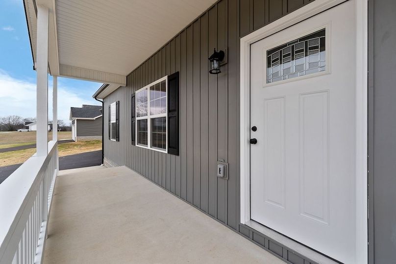 Pix 4 ext front porch view to L