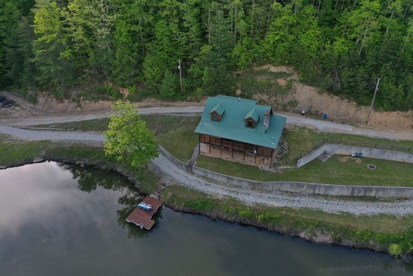 029 low elevation drone shot looking down on the cabin