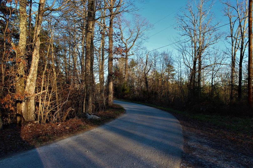 013 paved road access at northwest corner of property leading to camp