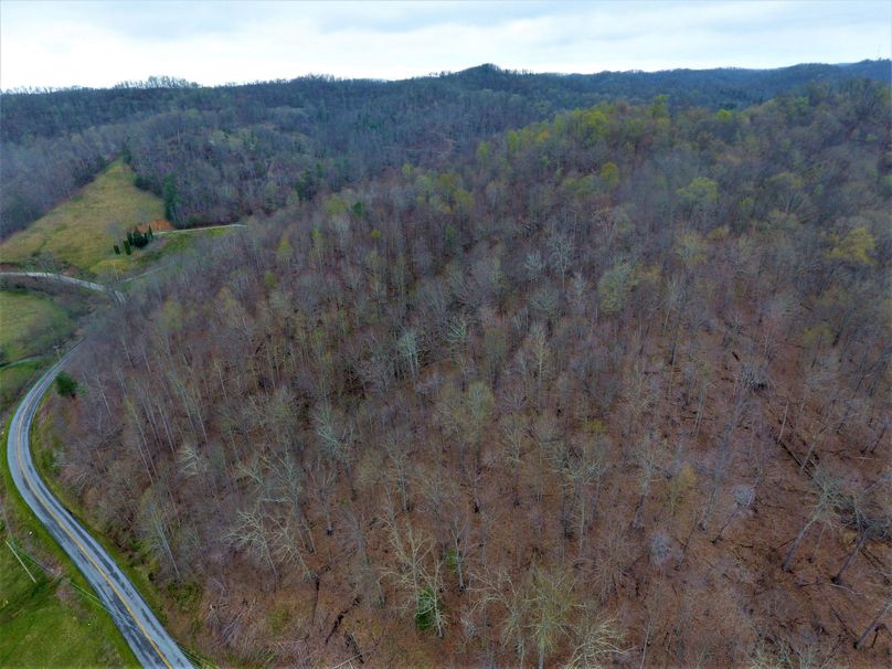 047 aerial drone shot looking down on the south west ridge top from above the entrance