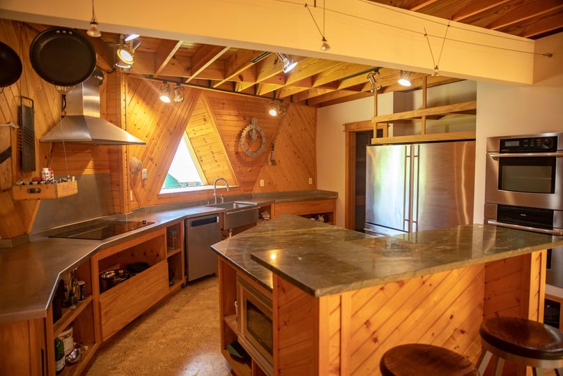 9 kitchen w  stainless countertops and cork floors-2