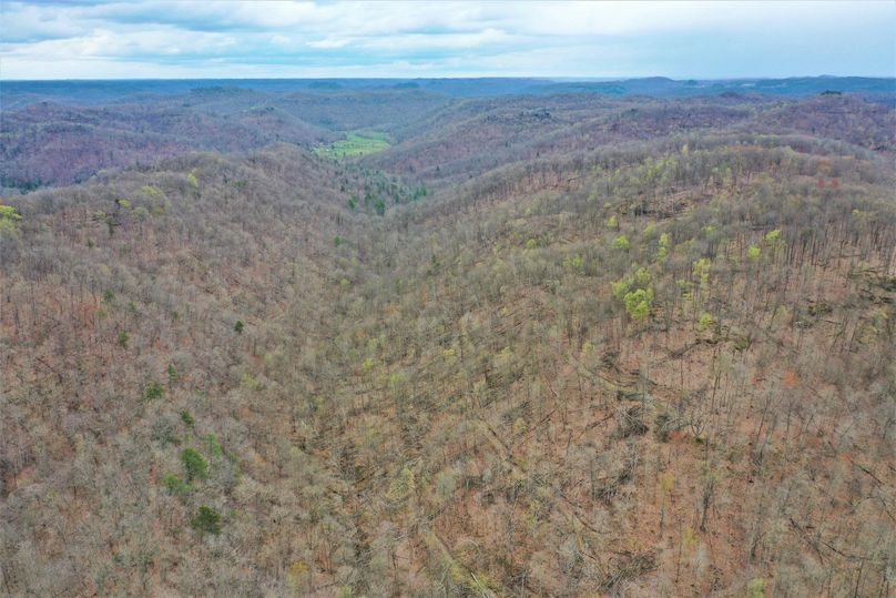 002 aerial drone shot from the north boundary looking to the southeast down the valley