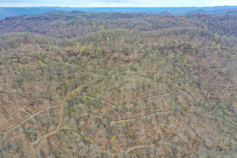 007 aerial drone shot from the southeast corner looking west along the west ridge