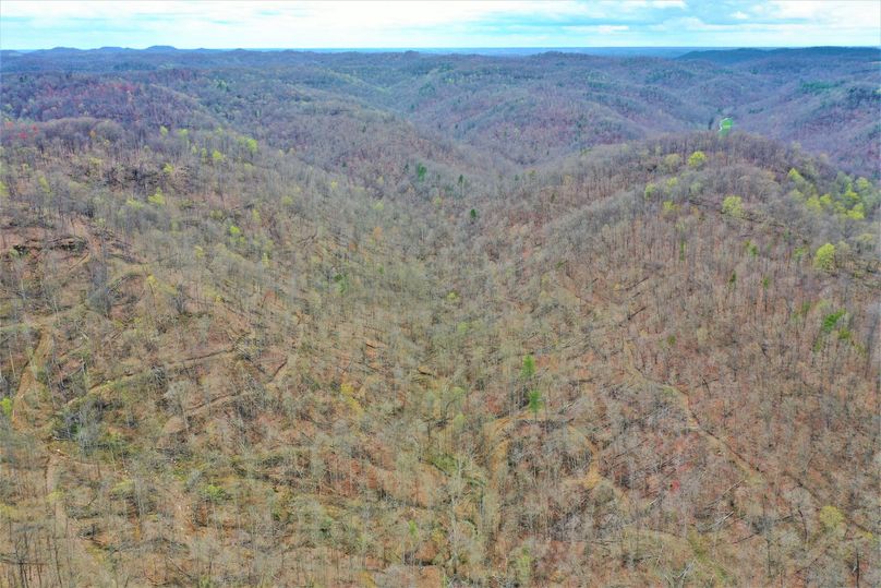023 aerial drone shot from the south boundary looking up the valley to the north