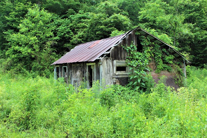 003 the old homestead sitting alongside the county gravel road