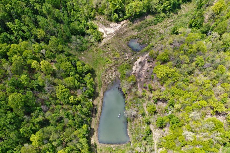 006 aerial drone shot of the pond and the second pond that was since breached