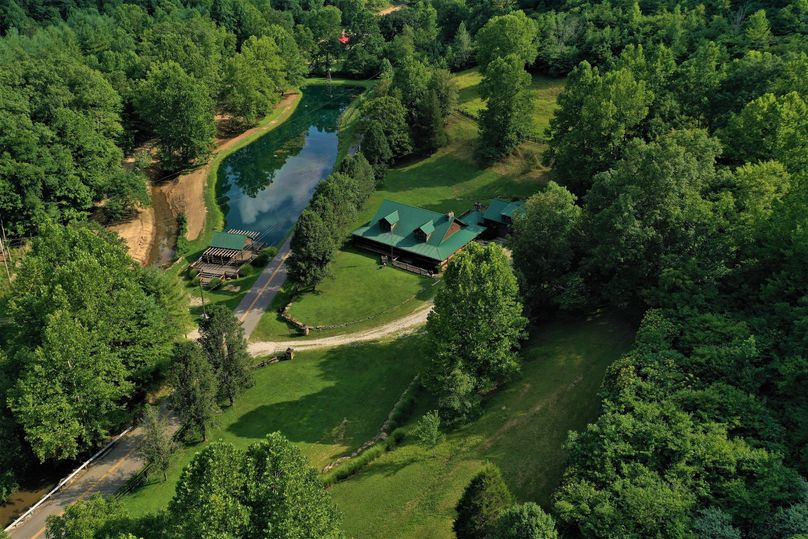 006 gorgeous aerial drone shot of the cabin and pond