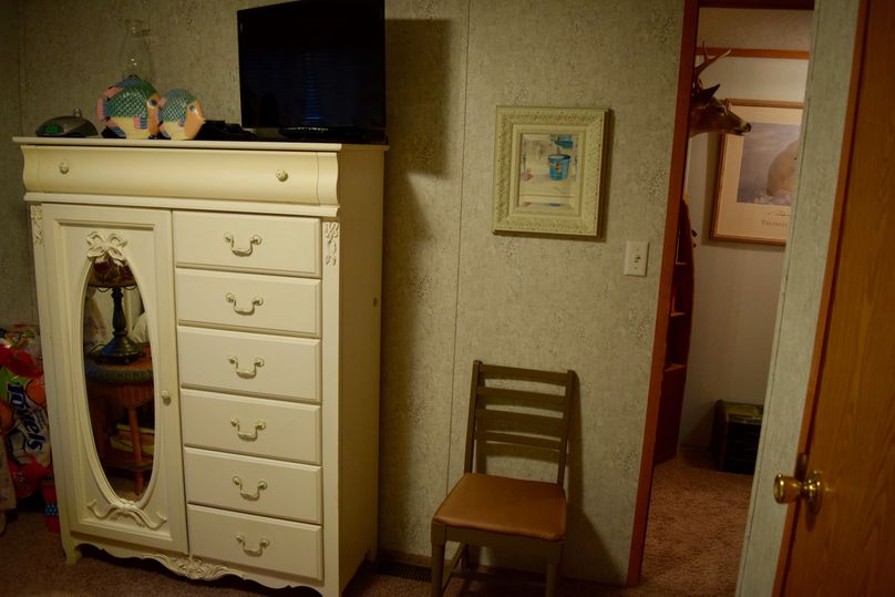 16 dresser cabinet in second bedroom-2