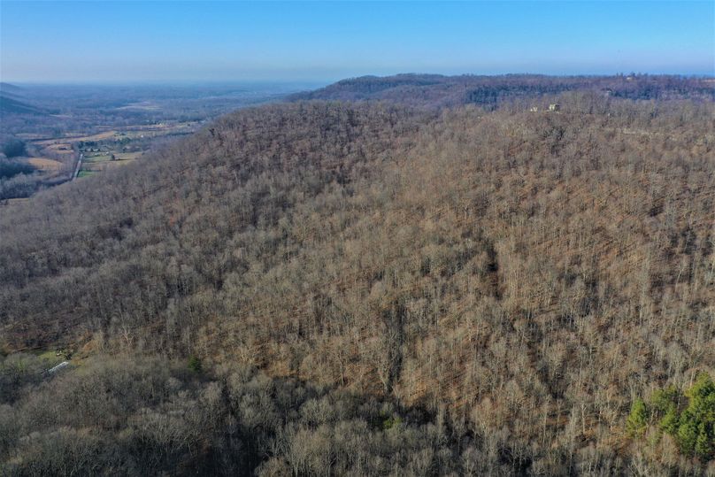 036 aerial drone shot from the middle of the property looking northwest toward clay city
