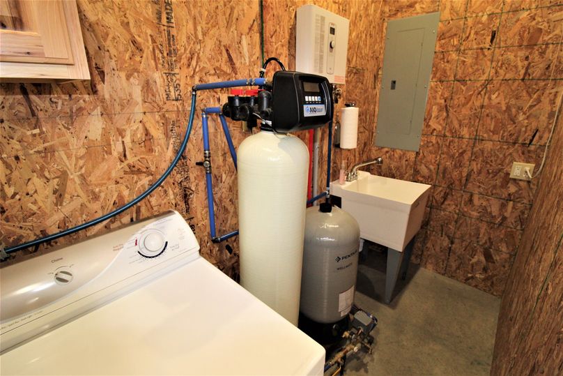 051 well water purification system, utility sink and panel box contained in the utility room