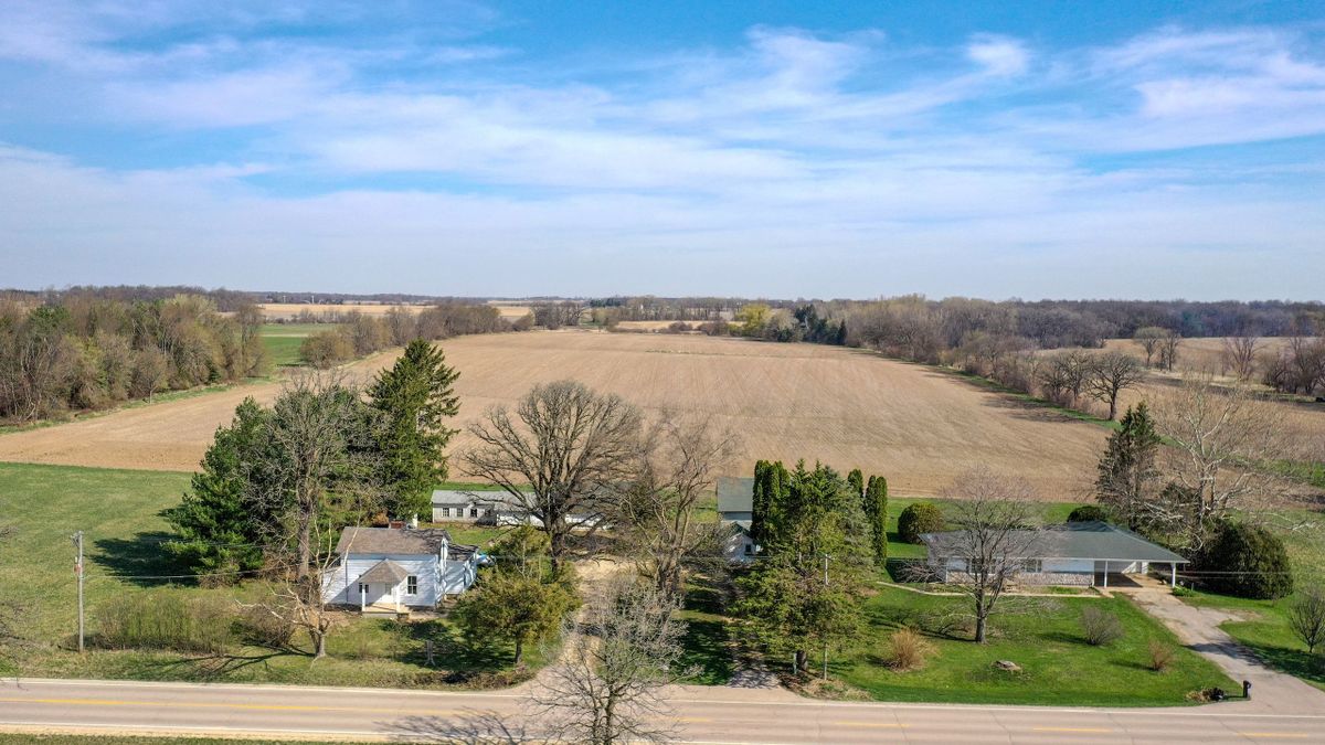 Two Homes And Outbuildings On Small Acreage For Sale Near Poplar Grove