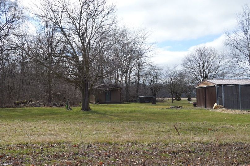 1 view of cabin and shed