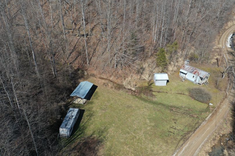 001 aerial drone shot of the structures on the property