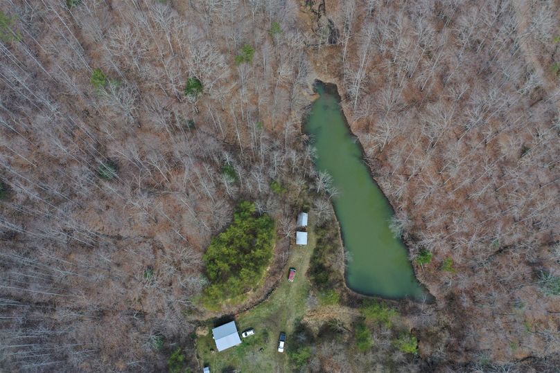 021 aerial drone shot of the home, garage, storage building and pond
