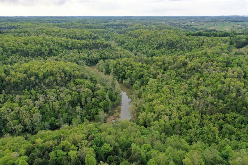 027 aerial drone shot at the west area of the property overlooking the daniel boone national forest and cave run lake headwaters