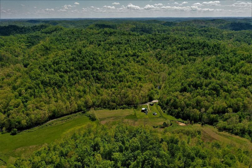 003 aerial drone shot looking southeast over the property