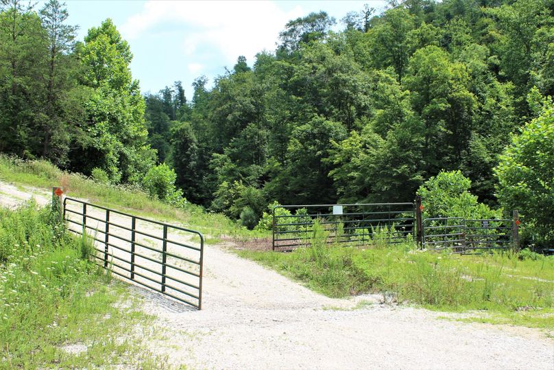 004 the gated entrance at the west edge of the property off of ky 205
