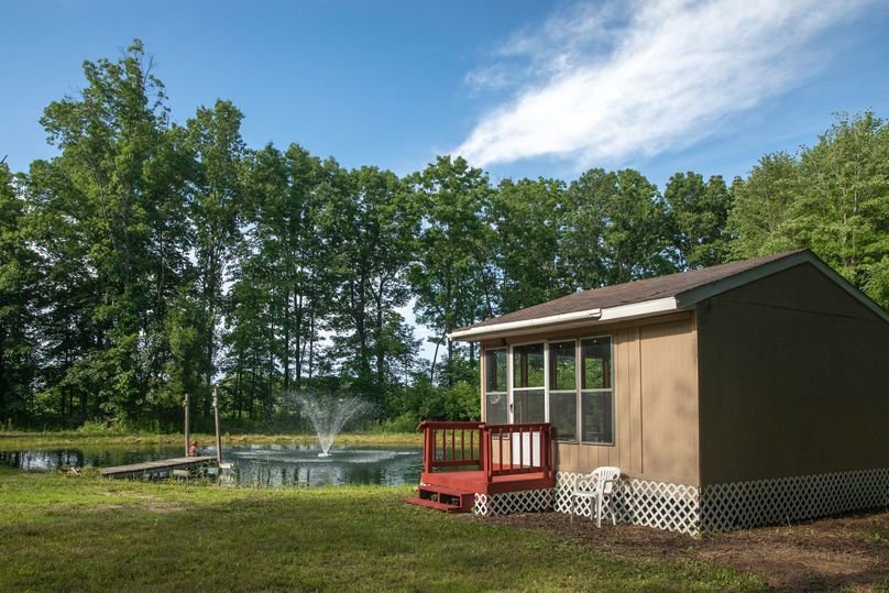 7 cabin on separate pond with fountain