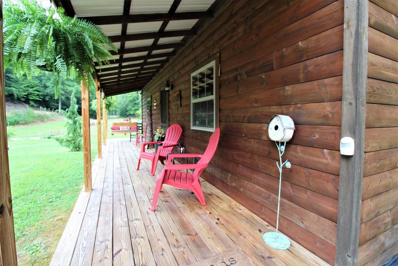 038 front porch of the cabin as you step on from the right side