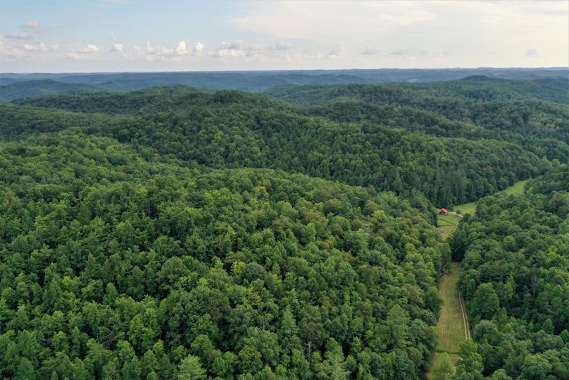 035 aerial drone shot from the center of the property looking to the southwest down the valley