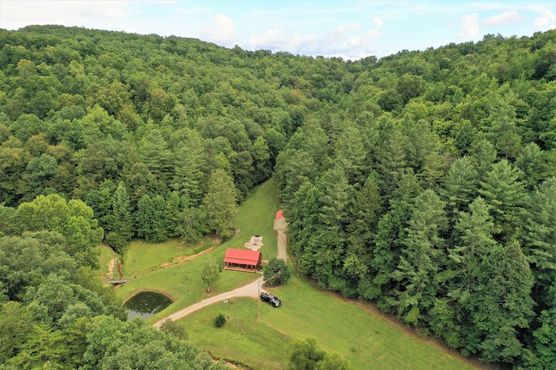 033 aerial drone shot of the structures looking up the valley