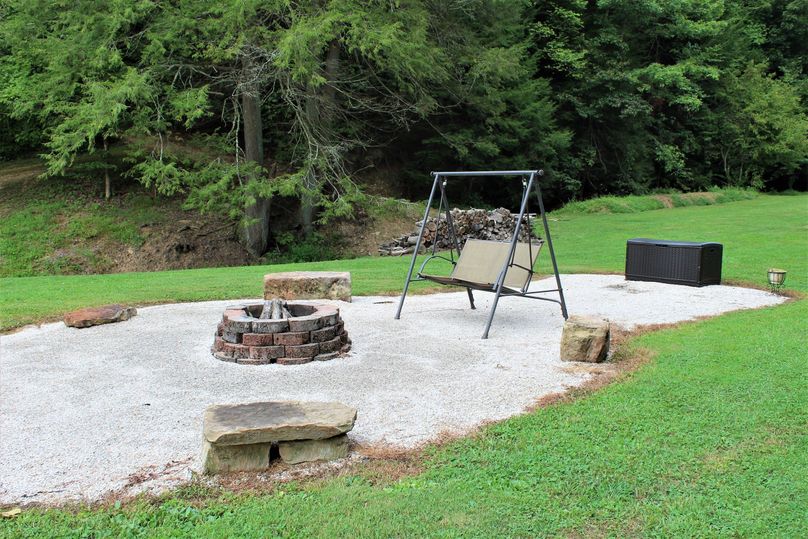 006 the well groomed and maintained firepit area where the tall tales are told