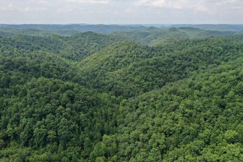 001 aerial drone shot from the north boundary looking south up the valley