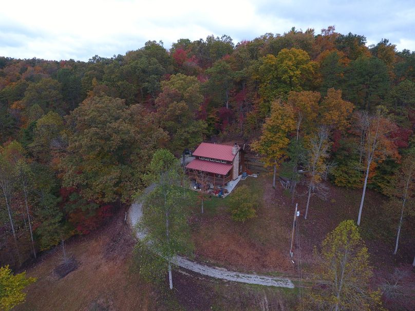 026f low elevation drone shot of the cabin